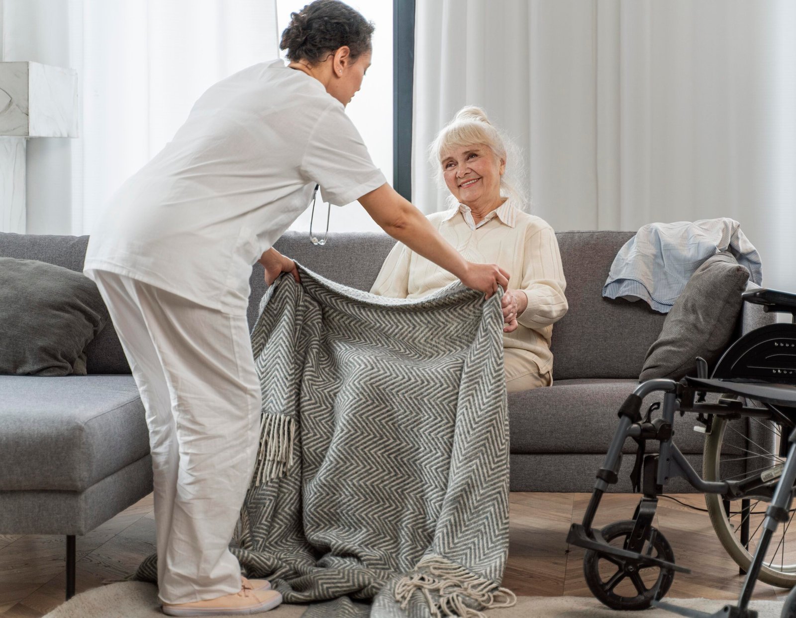 Doctor taking care of senior woman at home